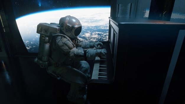 Astronaut hraje na klavír. Astronaut hraje na klavír.