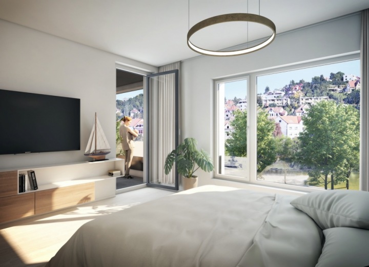 Interiér s výhledem. Řadové domy na Praze 4