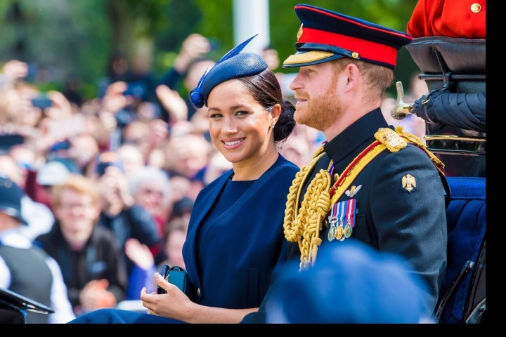 Meghan Markle s princem Harrym v kočáře Meghan Markle s princem Harrym v kočáře