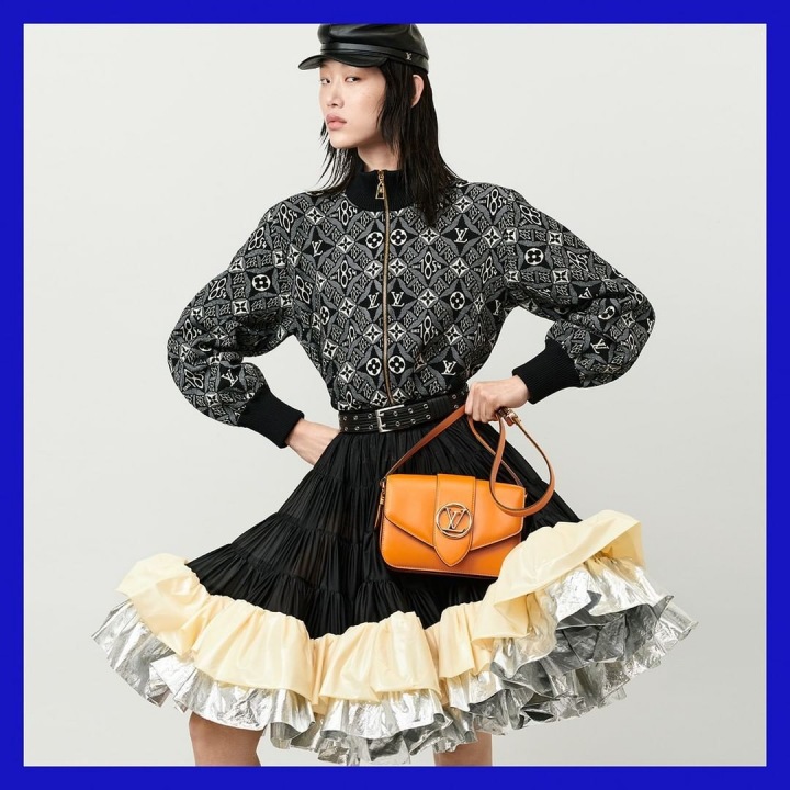 Žena s kabelkou Louis Vuitton Žena s kabelkou Louis Vuitton